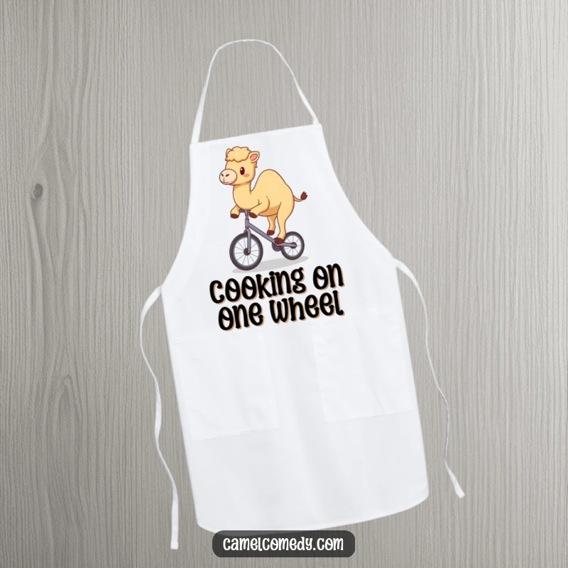 Funny apron with a kawaii camel happily wobbling on a tiny unicycle, bringing circus humor to the kitchen.