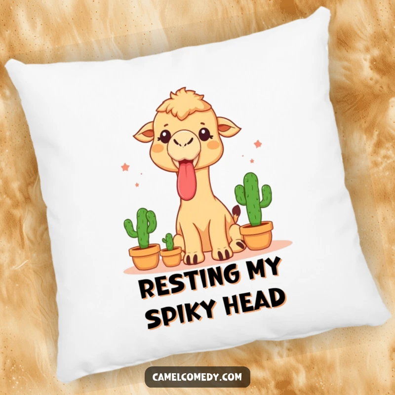 Funny pillow featuring a camel sticking its tongue out while juggling three small cacti, adding quirky comfort to any space.