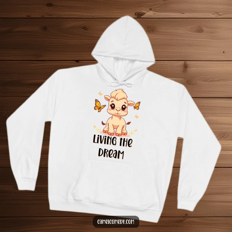 Funny hoodie featuring a cute camel with wide eyes chasing a butterfly, offering humorous warmth and whimsical charm.