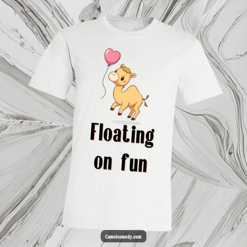 Funny t-shirt with a playful camel whose tail is attached to a bright balloon, causing it to float slightly with a happy look.