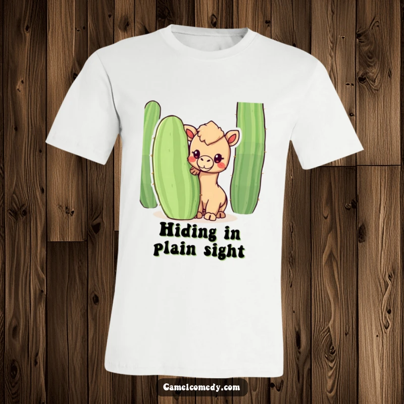 Funny t-shirt featuring a cute kawaii camel peeking shyly from behind a large cactus, embodying desert cuteness and humor.