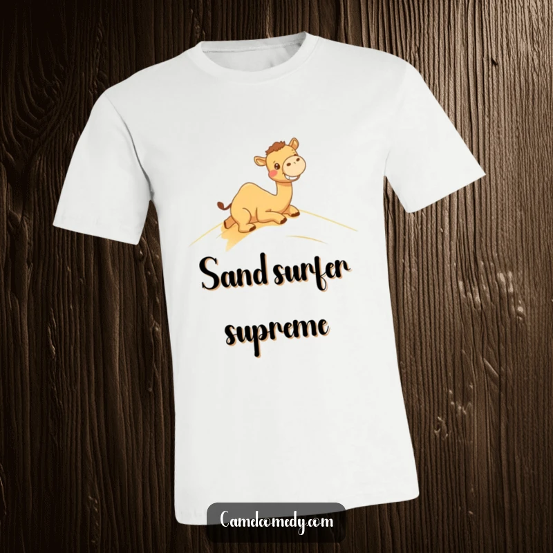 Funny t-shirt featuring a kawaii camel grinning while sliding down a sand dune, capturing desert adventure humor.